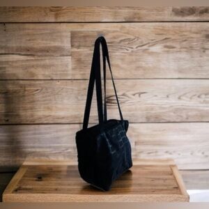 Laura Ashley diaper bag black stamped Laura Ashley everywhere with 2 pockets